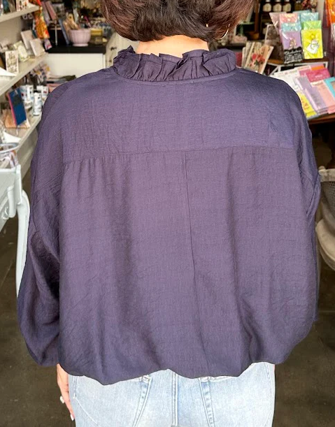Ruffed Bubble Hem Blouse